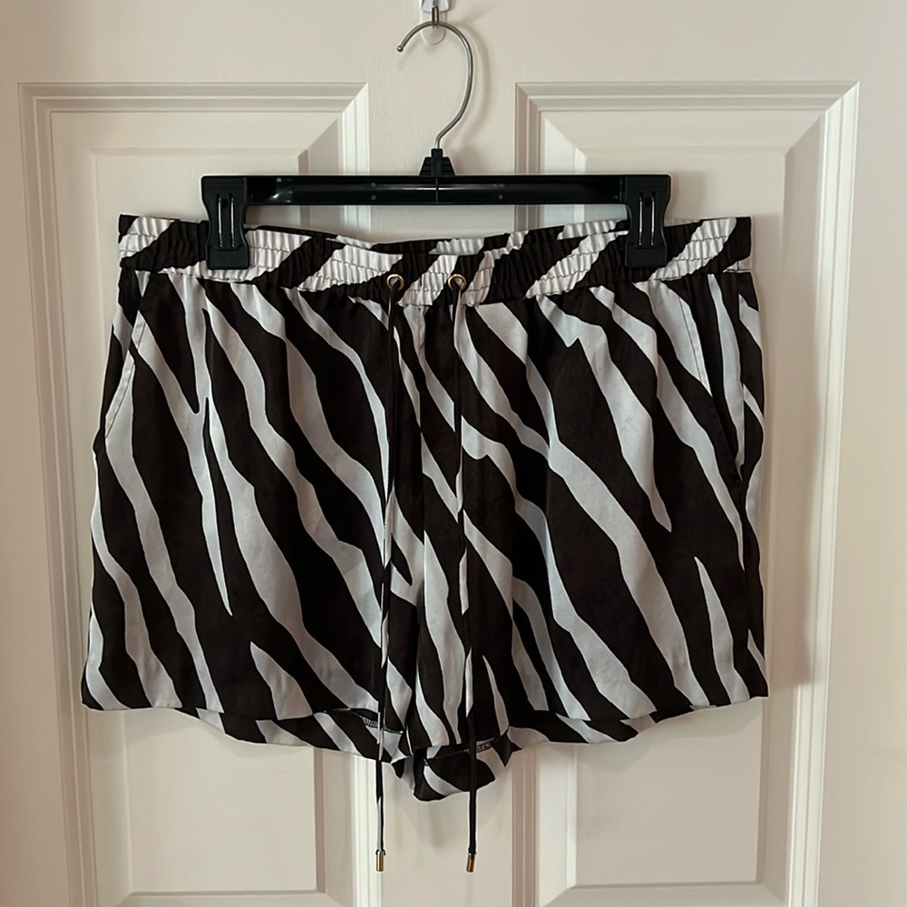 Michael Kors, woman’s, size 10, 100% polyester, brown & white patterned shorts.